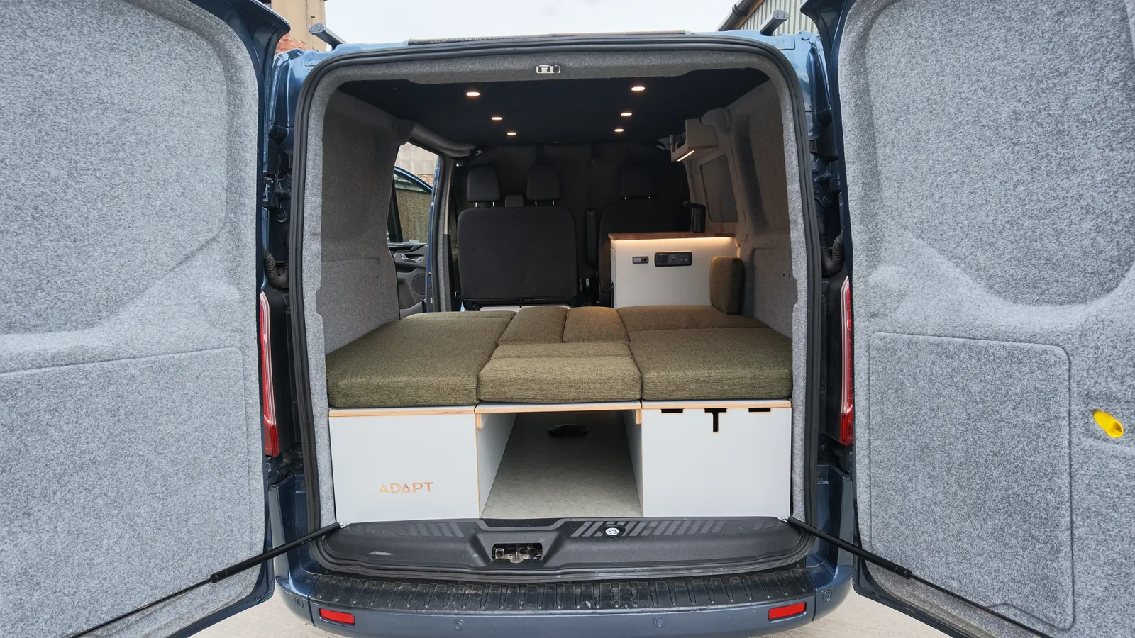 THE BLIND - Product photograph Rear view into a converted van fitted with THE BLIND